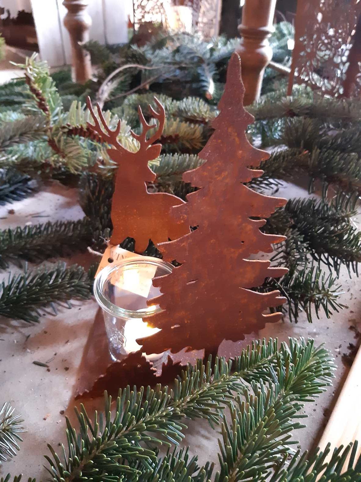 Tealight holder with deer and fir tree