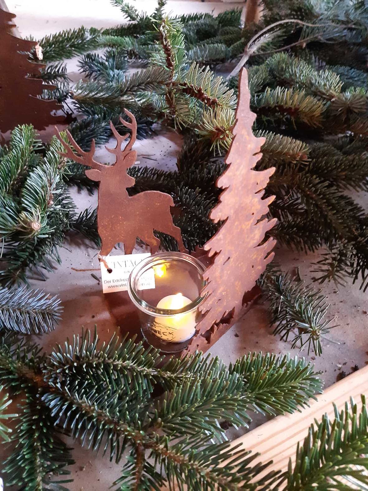Tealight holder with deer and fir tree