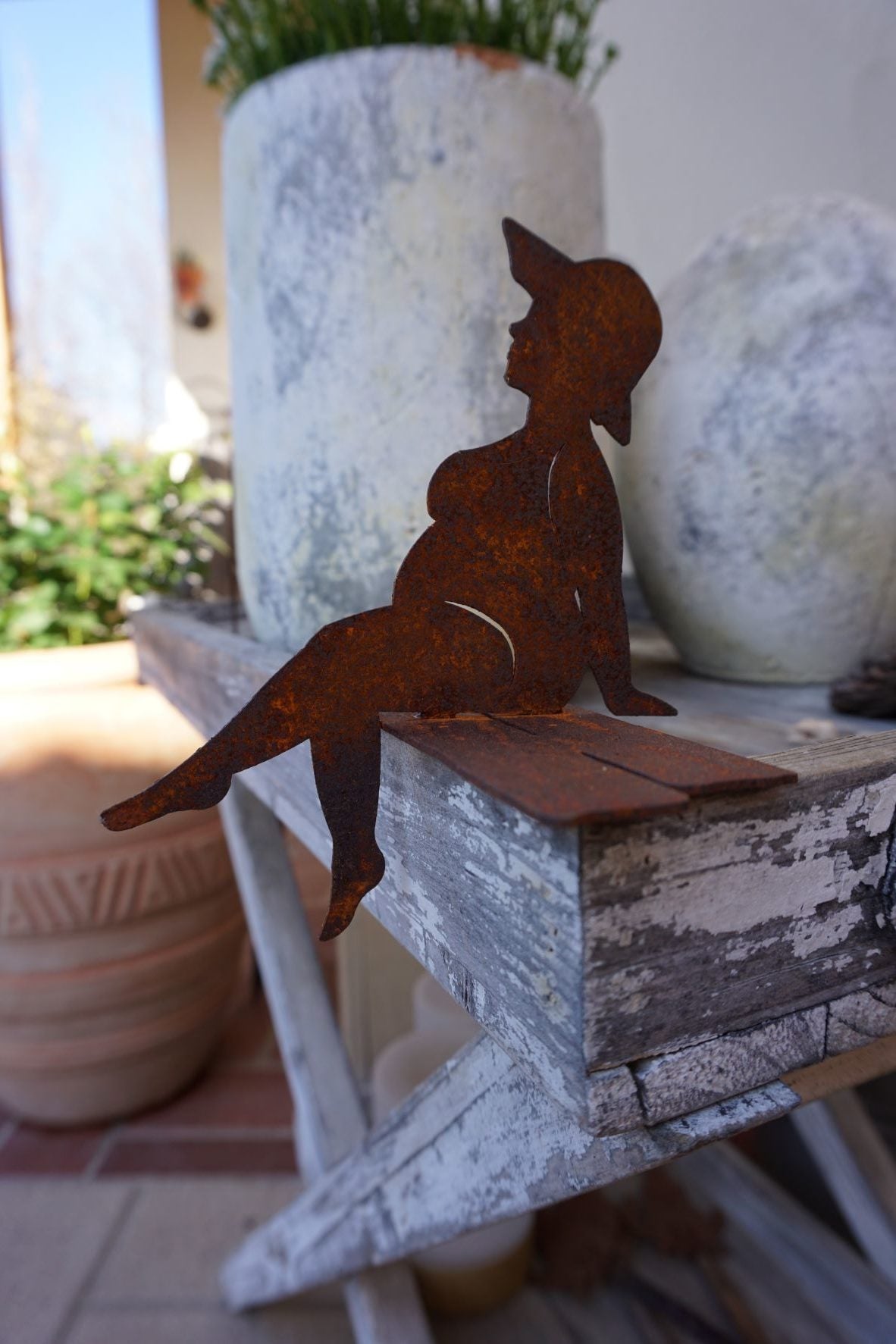 Bathing Beauty "PAULA" sitting on a pier