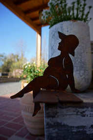 Bathing Beauty "PAULA" sitting on a pier