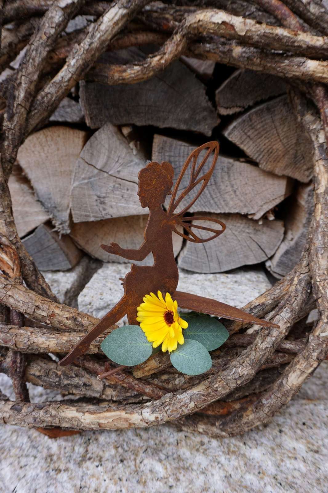 fairy sitting on a leaf