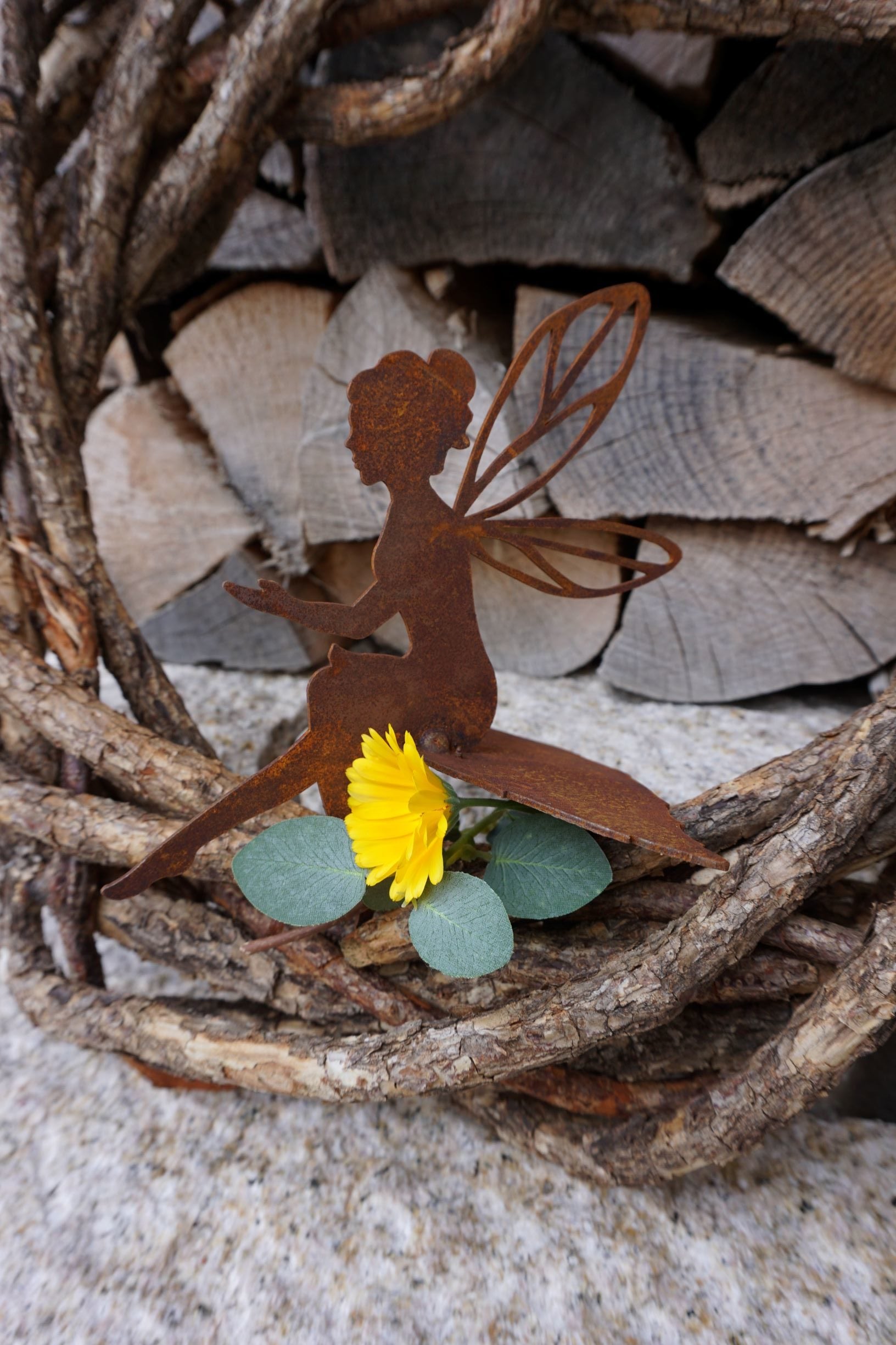 fairy sitting on a leaf