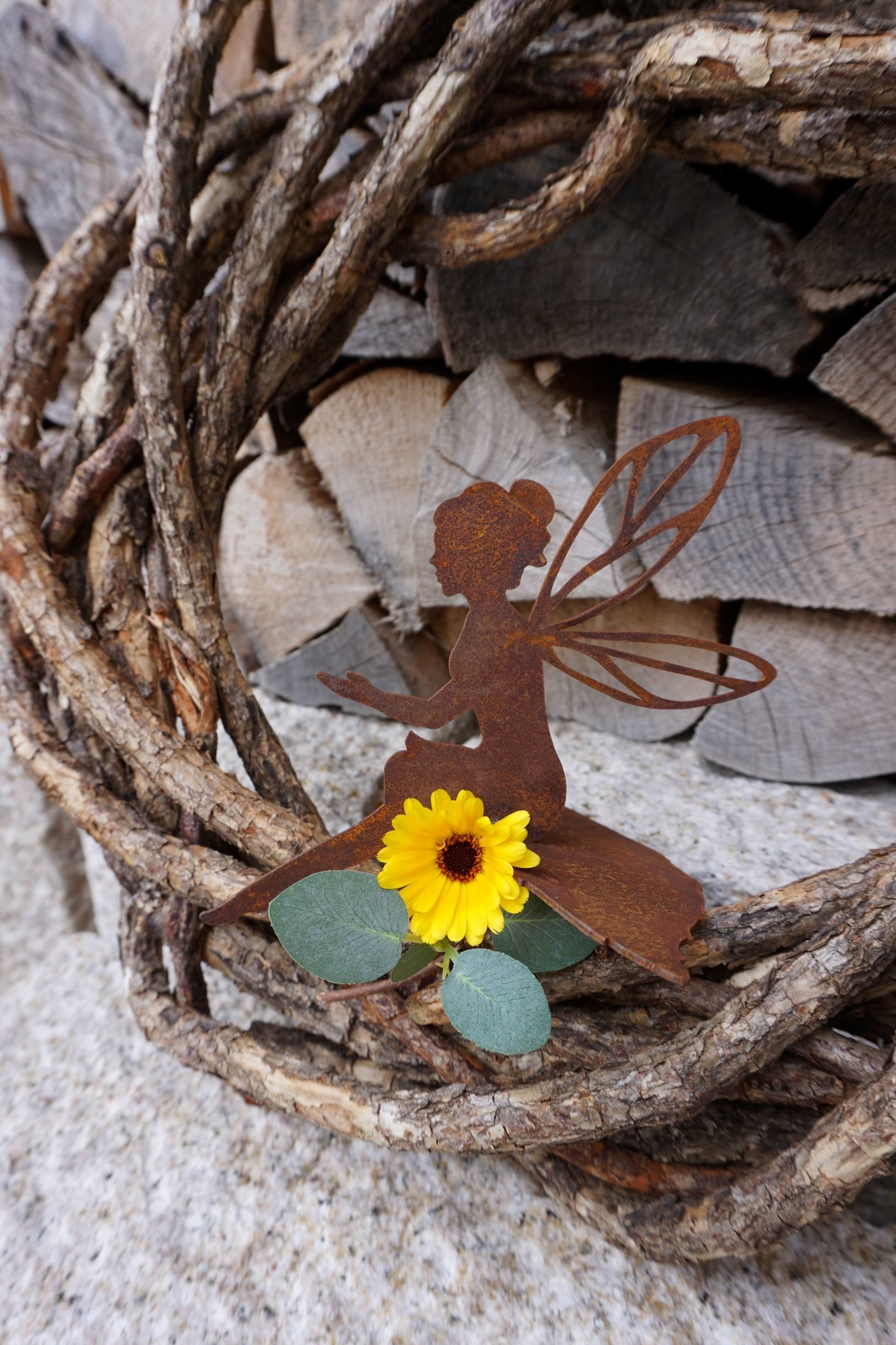 fairy sitting on a leaf