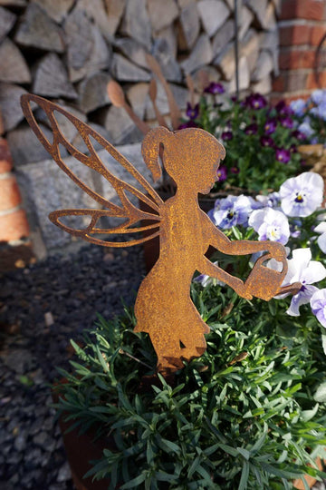 Gardening fairy with watering can