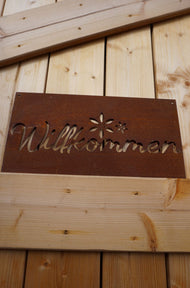 Sign "Welcome" with flower