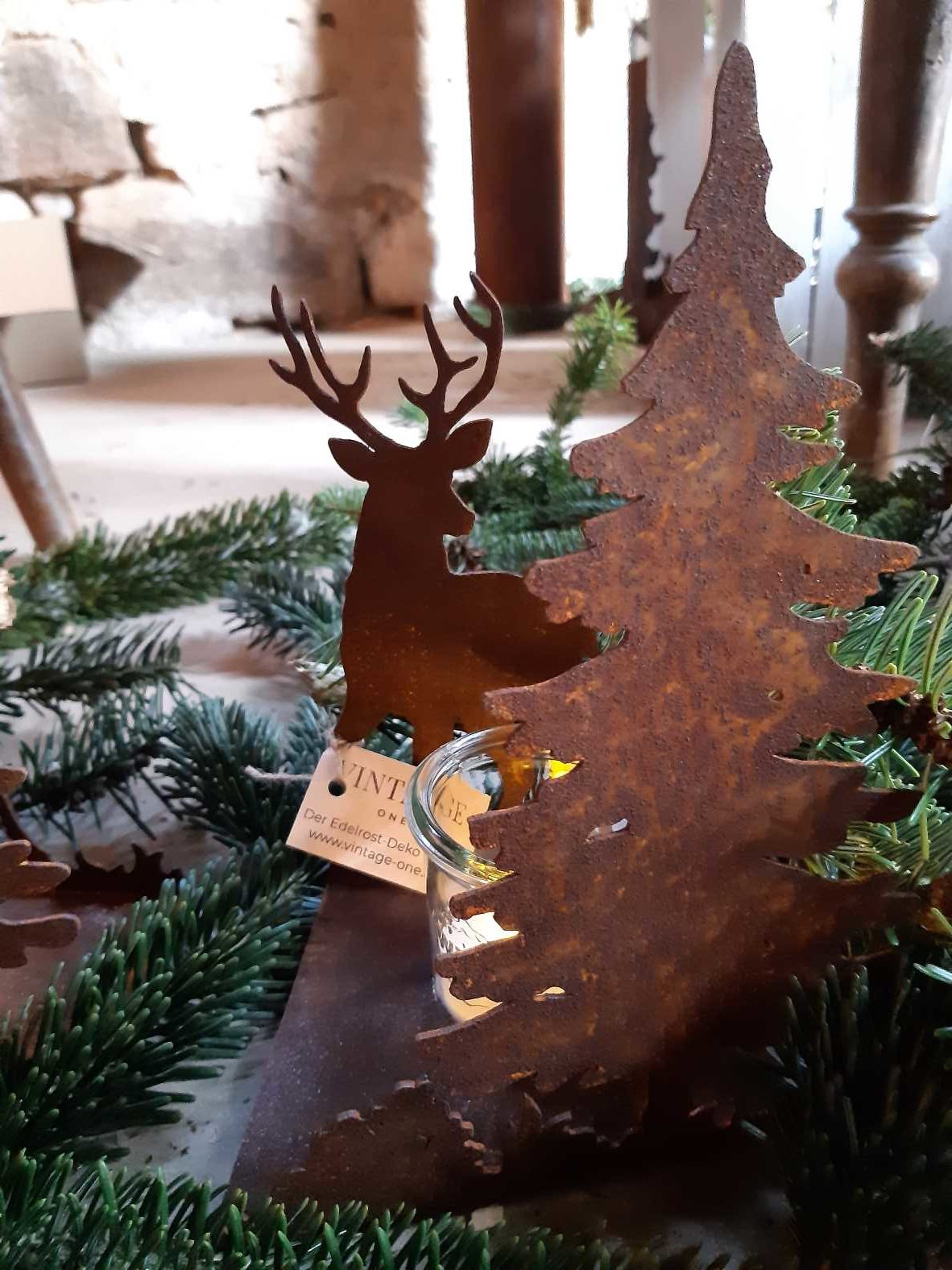 Tealight holder with deer and fir tree