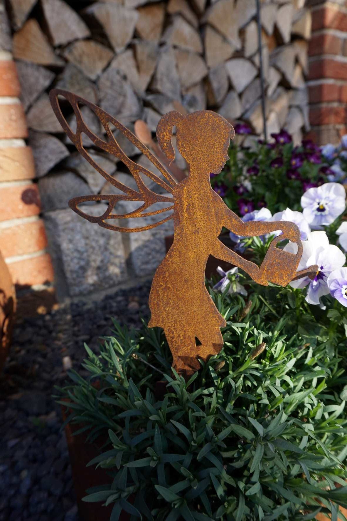 Gardening fairy with watering can