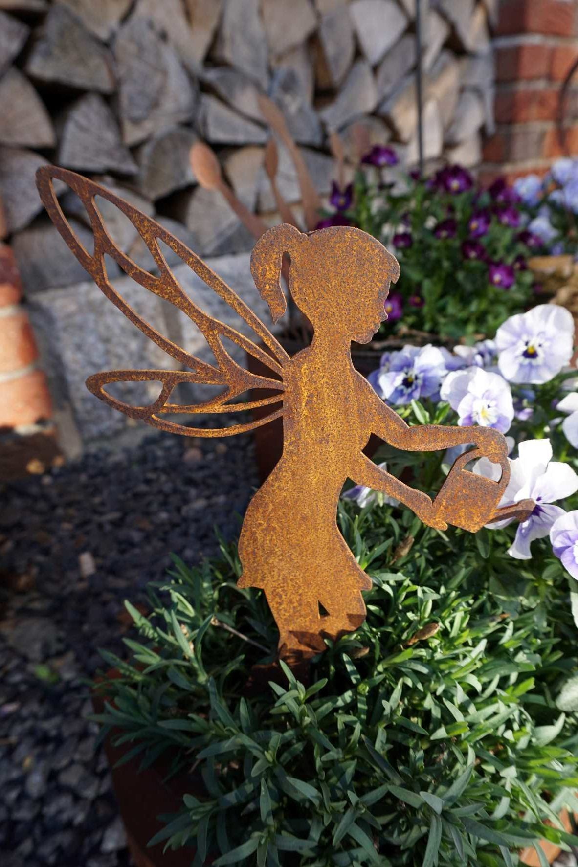 Gardening fairy with watering can