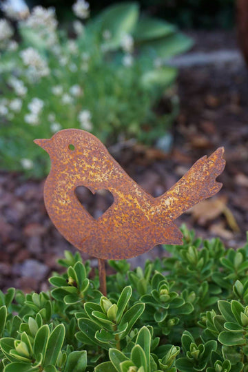 Bird with heart on a stick