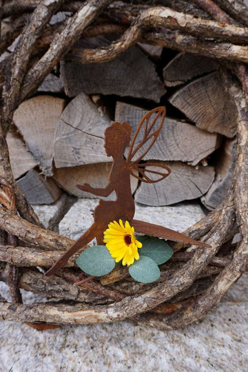 fairy sitting on a leaf