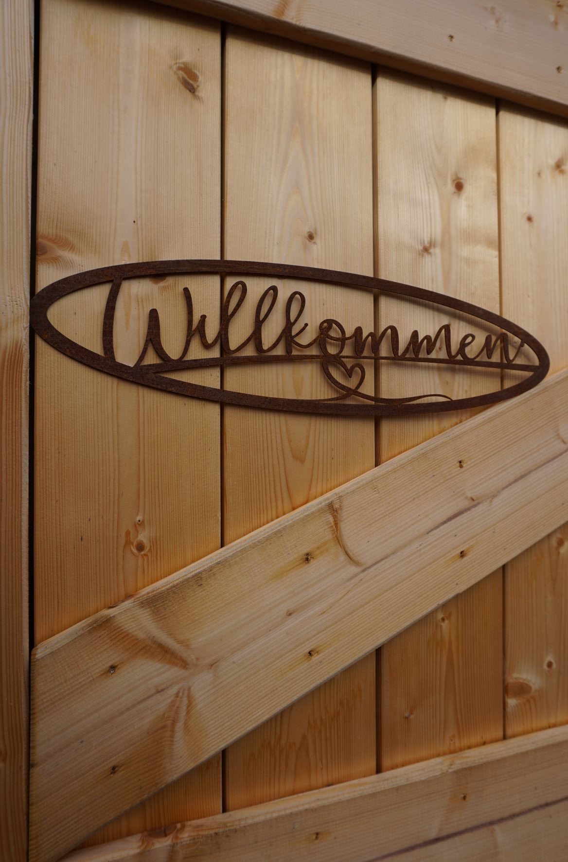 Schild "Willkommen" mit Herz