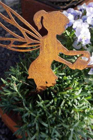 Gardening fairy with watering can